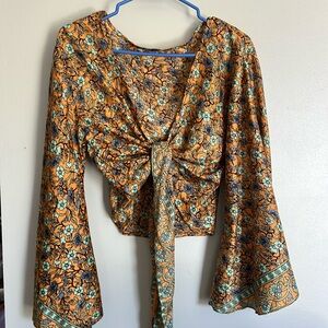 Long sleeve front tie cropped shirt from a local shop